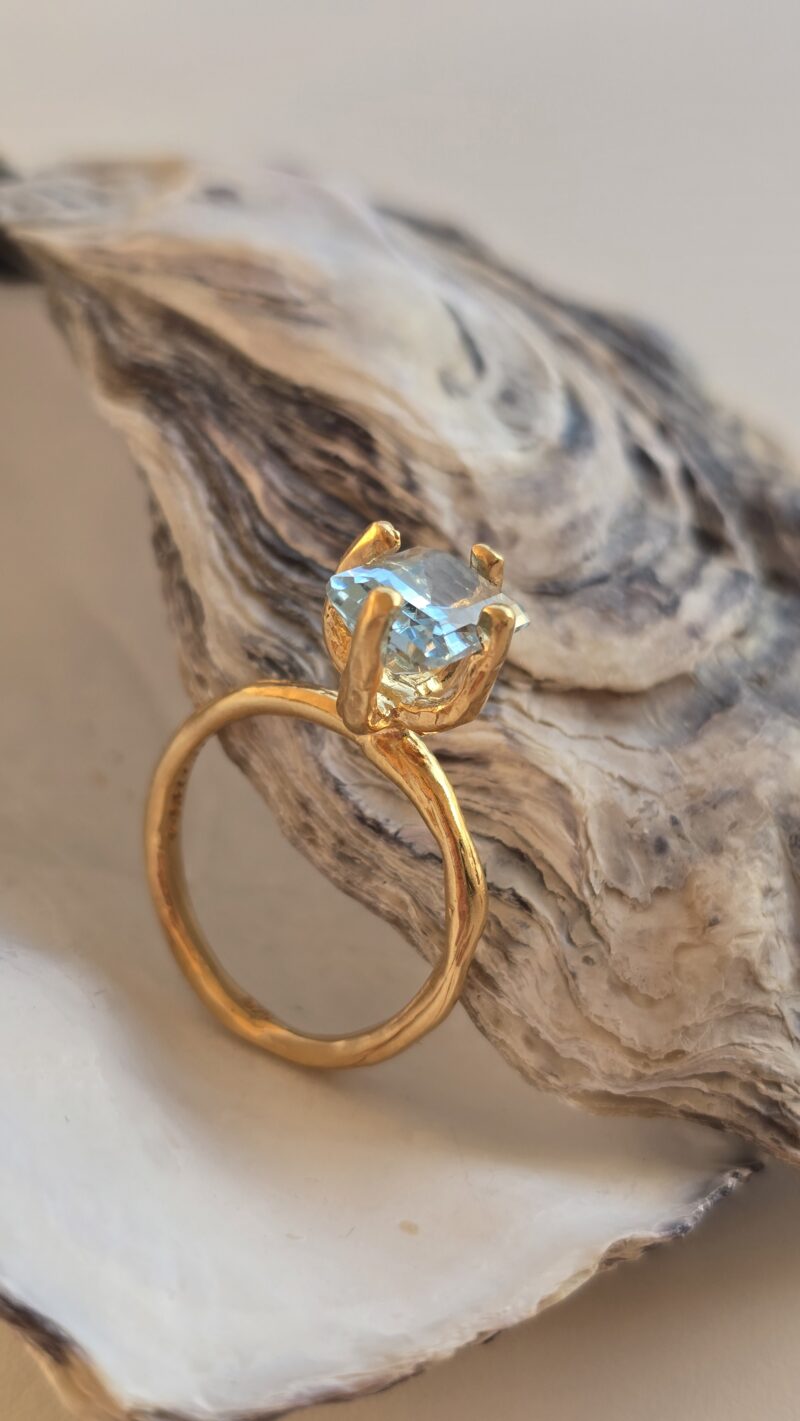 ring with blue topaz made os silver goldplated