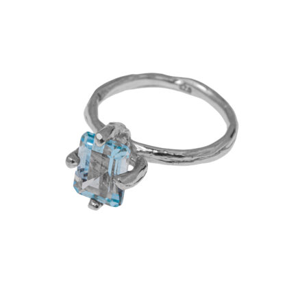 ring with blue topaz made of silver